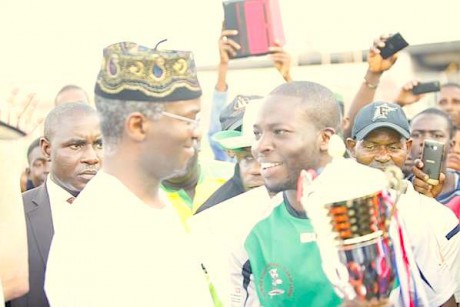 Lagos state Governor; Babatunde Raji Fashola with Cowry RFC Captain Azeez Ladipo