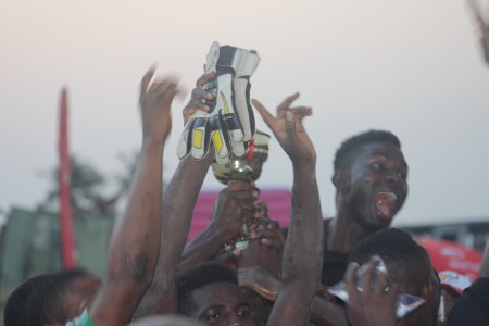 Owibesebe Celebrate their victory at the EkoFootball beach Soccer Tournament 2014