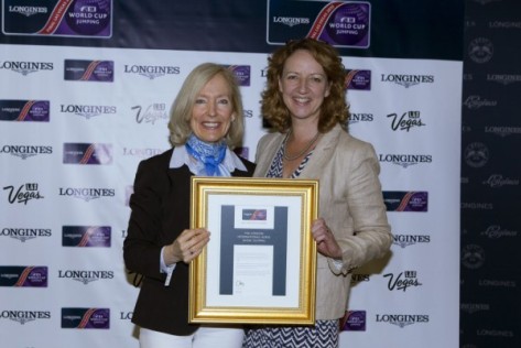  FEI Director of Press Relations Grania Willis presents Jo Peck, press officer for the London International Horse Show, Olympia, with the Best Press Office award for the Longines FEI World Cup™ Jumping Western European League 2014/2015 at the Longines FEI World Cup™ Jumping Final in Las Vegas (NV). (Photo: Dirk Caremans/FEI)
