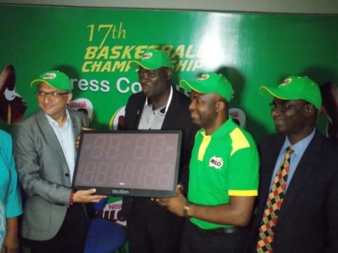 President FIBA Africa (Zone 3) Col. Sam Ahmedu  presents an electronic scoreboard to the organisers of the MILO championship 