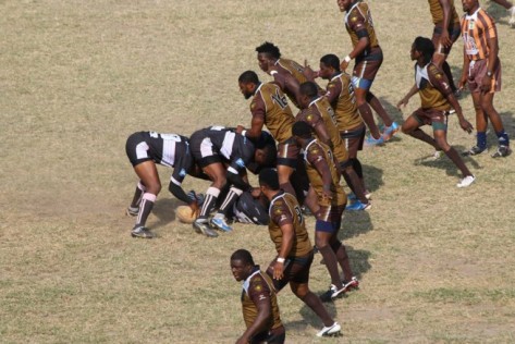 Cowrie RFC in a defensive line