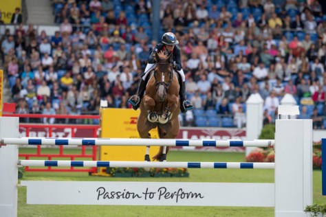  French rider Penelope Leprevost galloped to victory with Flora de Mariposa in the first Team and Individual qualifier at the FEI European Jumping Championships 2015 in Aachen, Germany today. (FEI/Dirk Caremans)  