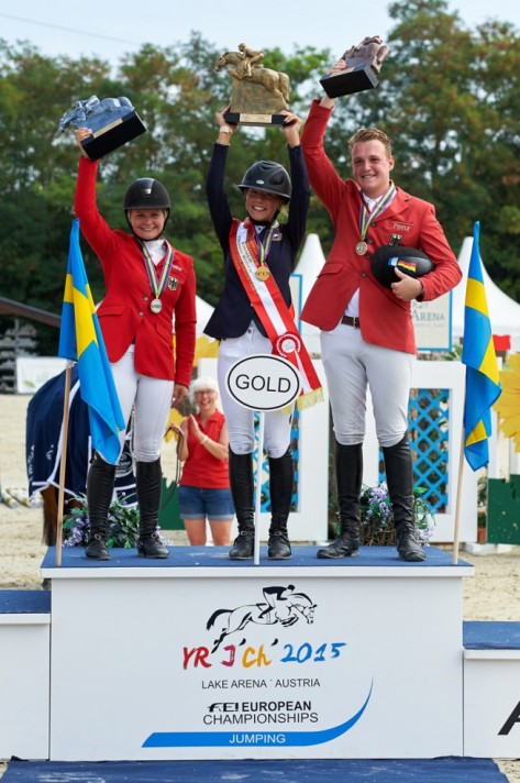 (L to R) Young Rider medallists Kaya Luthi from Germany (silver), Ebba Larsson from Sweden (gold) and Guido Klatte from Germany (bronze) at the FEI European Jumping Championships for Children, Juniors and Young Riders 2015 at Wiener Neustadt, Austria. (FEI/Hervé Bonnaud)