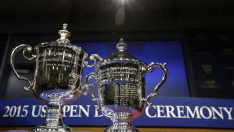 The U.S. Open mens's and women's singles tennis trophies are displayed before the U. S. Open Draw Ceremony at the USTA Billie Jean King National Tennis Center in New York, Thursday, Aug. 27, 2015. (AP Photo/Kathy Willens)