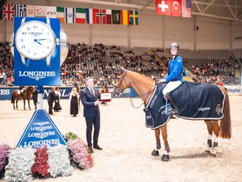 French rider, Penelope Leprevost, pictured with Morten Thormodsen, Brand Manager Longines Norway, after winning today’s first leg of the Longines FEI World Cup™ Jumping 2015/2016 Western European League at Oslo (NOR) riding Flora de Mariposa. (FEI/Mette Sattrup)