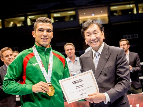 Moroccan welterweight Mohammed Rabii with AIBA  President Dr Ching-Kuo Wu