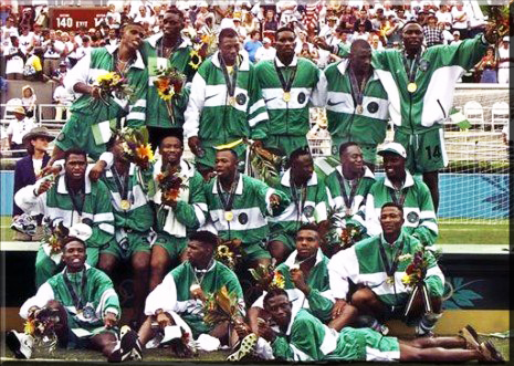 The Nigerian Dream Team celebrate their gold medal at Atlanta 96 Olympic games, photo credit: sundayoliseh.tv 