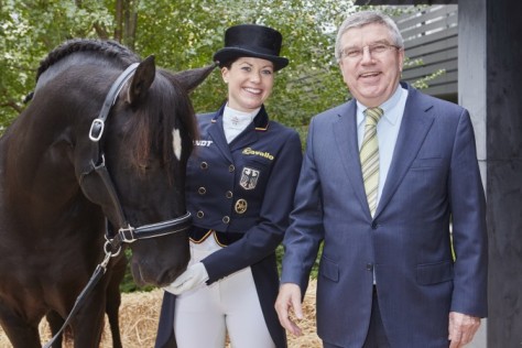 (left) Kristina Bröring-Sprehe (GER), team silver medalist at the London 2012 Olympic Games, is the new world Dressage number one with Desperados FRH. Bröring-Sprehe is pictured here with International Olympic Committee President Thomas Bach during his visit to FEI Headquarters in Lausanne (SUI) last November. (Liz Gregg/FEI)